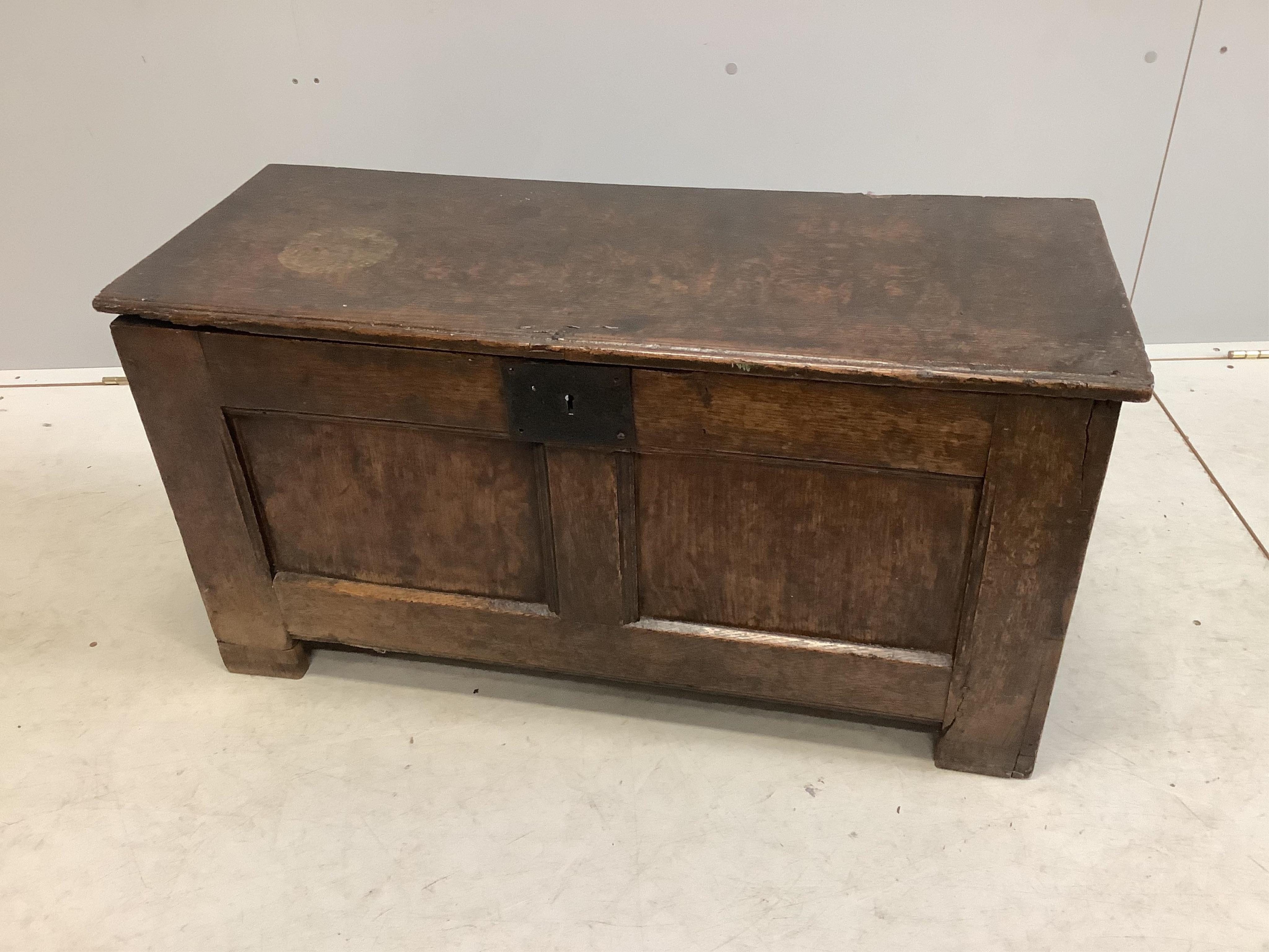 A small early 18th century panelled oak coffer, width 90cm, depth 36cm, height 47cm. Condition - fair